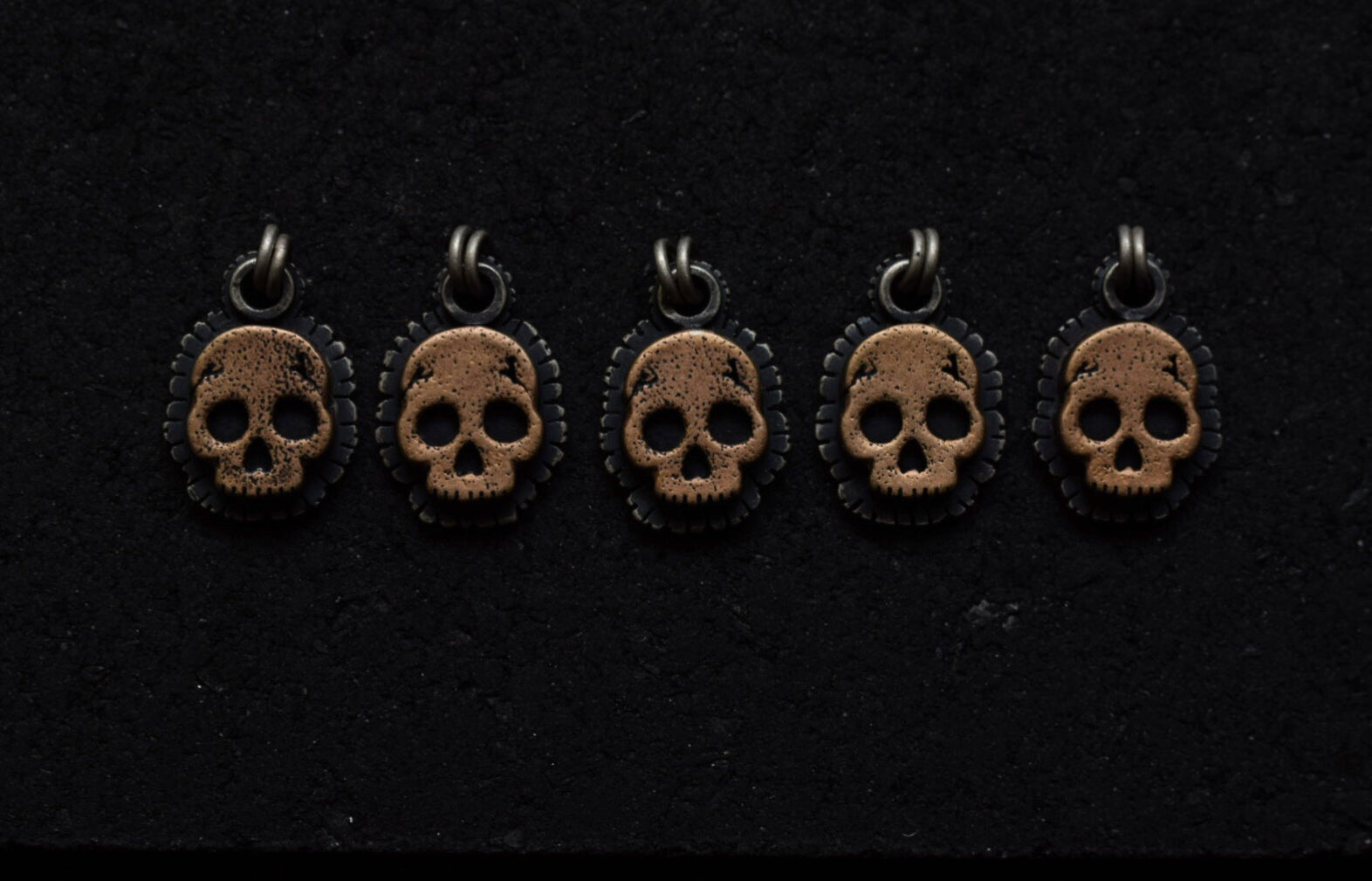 Bronze Marigold Skull Necklaces
